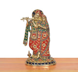 Full-length Radha Krishna brass statue with ornate arch headpiece and jeweled robes