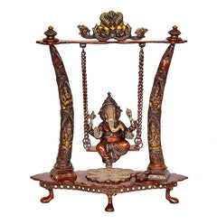 Brass Ganesha swing idol on round base with detailed columns and chains