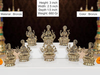 Brass Ashtalakshmi statues, eight small seated goddess figures with ornate crowns