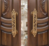 Brass main door pull handle pair with filigree flower detailing, two-piece set