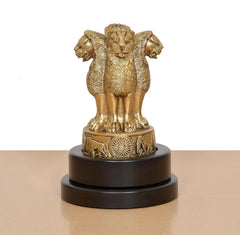 Brass Ashoka figurine, smiling face and four-armed pose on revolving dark base