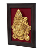 Brass Maa Durga idol head relief, angled view in dark wooden framed wall hanging
