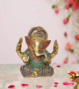 Ganesha brass idol with seated pose, colorful gem-patterned robe and four raised hands