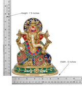 Brass Ganesha statue, 7.5 in height and 6 in width, colorful jeweled robe