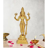 Brass four-armed standing Vishnu statue on pedestal with ornate chest and waist details