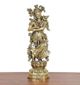 Superfine brass Radha idol, front view, ornate crown, flowing dress and decorative base