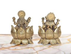 Rear view of Lakshmi and Ganesh brass statue pair, crowns and lotus seat patterns