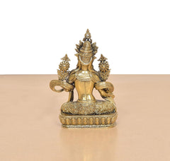 Brass Tara Devi statue, rear view with twin hair curls and ornate back halo details