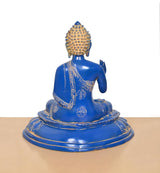 Blue brass Buddha statue back view, seated meditation with gold patterned base