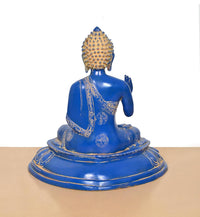 Blue brass Buddha statue back view, seated meditation with gold patterned base