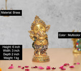 Brass Baby Ganesha sculpture, 6 inch height, multicolor Meenakari inlaid, front view