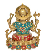 Brass Ganpati Murti back view, teal outfit with floral motifs and golden halo