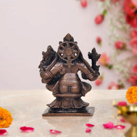Copper Bhu Varaha Lakshmi idol, back view, circular halo and arched hand gestures