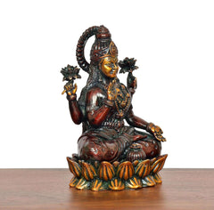 Lakshmi Brass Idol side view, seated pose with beaded crown and lotus base