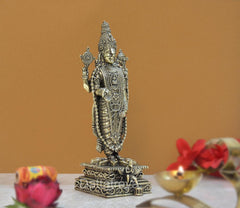 Brass Tirupati Balaji statue from front-left angle with detailed face and jeweled chest