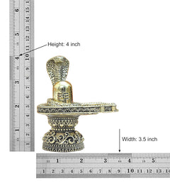 Brass shivling with cobra hood; height 4 in, width 3.5 in (measured).