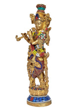 Brass Lord Krishna figurine with crown and flute, detailed gold frame, blue base