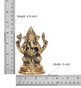 Brass Ganesha idol, 4.5 in height and 3 in width, detailed seated figure.