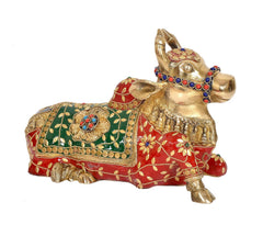 Brass Nandi seated figurine, multicolor patterned saddle and jeweled neck ring
