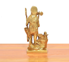 Gold brass Parshuram murti statue, rear view showing axe handle and patterned pedestal