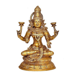 Brass Lakshmi statue front view, seated cross-legged on lotus base