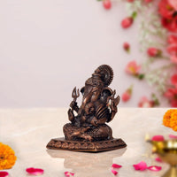 Copper Lord Ganpati murti, side angle, raised hands and ribbed crown