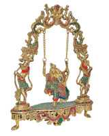 Brass Radha Krishna swing statue, front view on decorative base with colored inlay