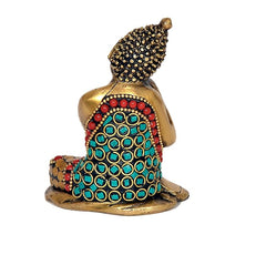 Brass Gautam Buddha resting idol from behind, jeweled robe details with teal circles