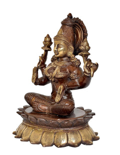 Brass Lakshmi idol statue, side view with four arms and seated lotus pose