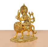 Durga Maa metal idol on lion, side view showing facial details and haloed head