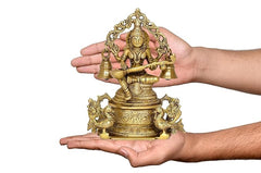 Brass Saraswati throne statue held in two hands, detailed bells and base