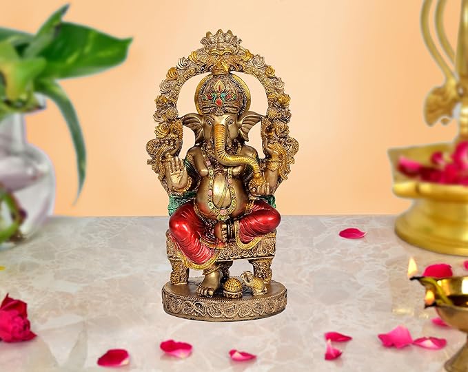 Resin Ganesha idol, seated pose, red dhoti, ornate gold crown, 10 in