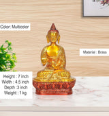 Brass Buddha idol, multicolored finish, seated Abhaya mudra, lotus base, 7-inch