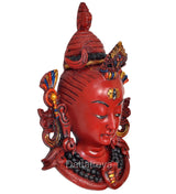 Red resin Shiva head wall hanging mask, side view, jeweled crown and coiled earrings