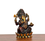 Ganesha brass idol holding a bowl, seated on lotus base, 5 inch height