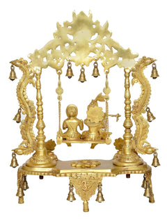 Golden brass Radha Krishna swing idol statue with sculpted figures and bell accents