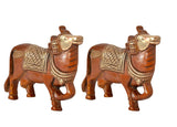 Brass Kamdhenu cow pair wall hanging, side angle showing textured bodies and necks