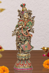 Brass Radha idol statue with green-red attire, gold crown, and ornate halo