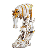 Resin horse and rider showpiece, white body with gold mane stripes, angled view