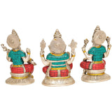 Sitting Lakshmi, Ganesha, Saraswati idols—silver tone backs, turquoise tops, red bases