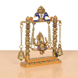 Brass Ganesha swing idol with multicolor Meenakari, patterned base border and bells