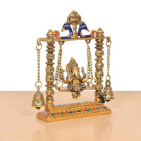 Brass Ganesha swing idol with multicolor Meenakari, patterned base border and bells