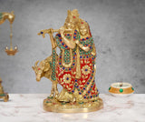 Brass Radha-Krishna idol with cow, multicolored jeweled garments, 9.5 in height