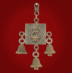 Brass Lakshmi wall hanging with four hanging bells and ornate floral square panel