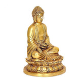 Gold Buddha lotus sitting statue, profile view with engraved robe and halo head