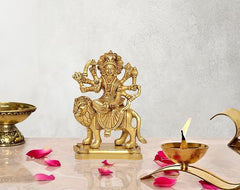 Durga Maa brass figurine seated on lion, ornate crown and raised arms, 5 inch