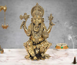 Brass Lord Ganesha idol, 10 inch, seated figure with raised hands and ornate crown