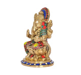 Brass Ganesha murti side view, multicolor jewel accents on crown and ornaments