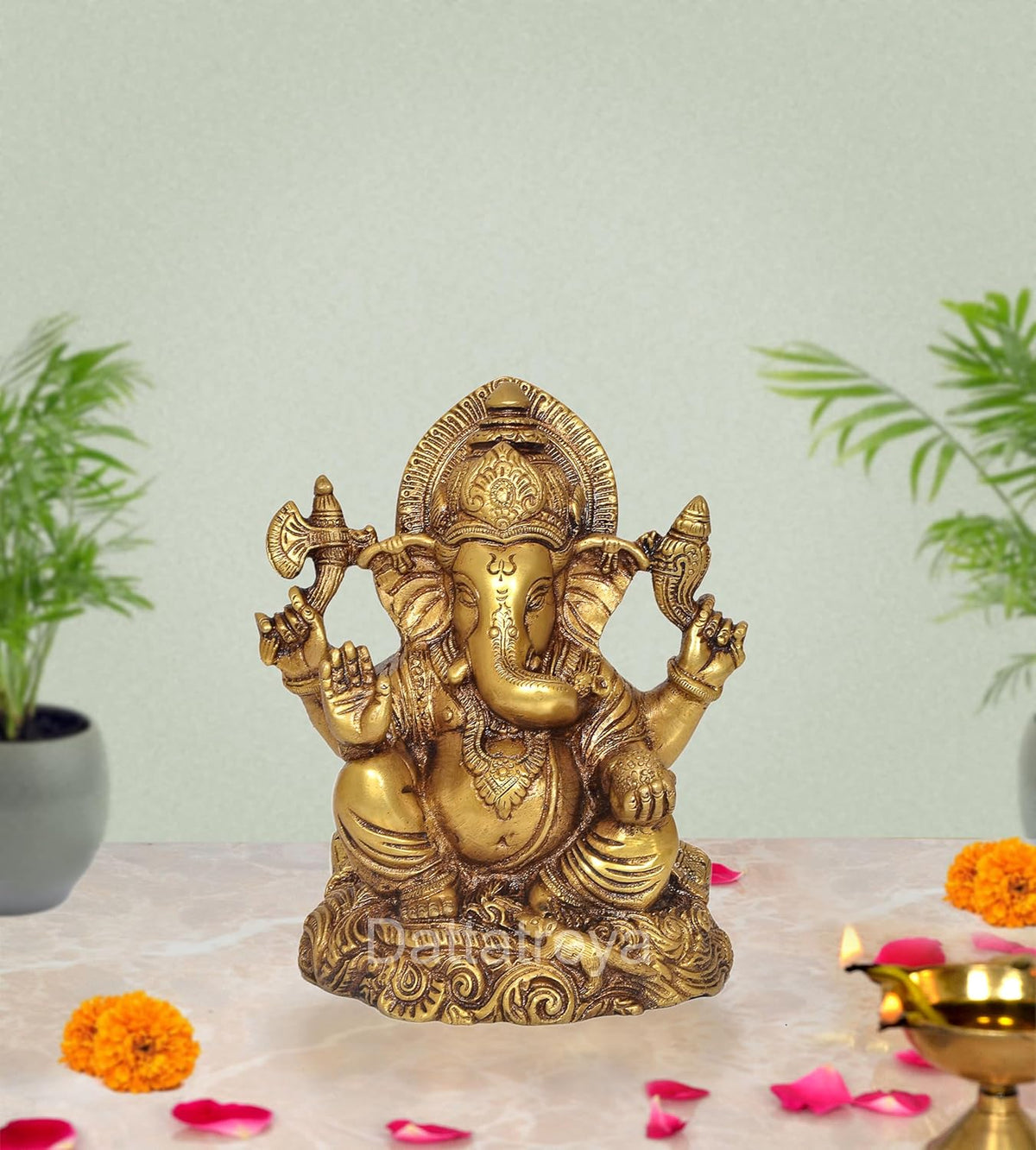 6-inch brass Ganesha statue, seated four-armed pose with ornate detailing