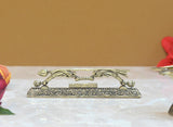 Brass Jai Shree Ram Dhanush mandir decor, side view with detailed arm and base